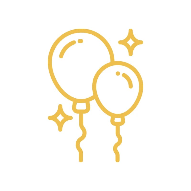 Colorful helium balloons floating against a bright background